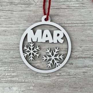 Bola de madera con copos de nieve